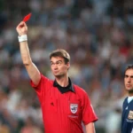 England Hit by Red Card in High-Stakes Clash