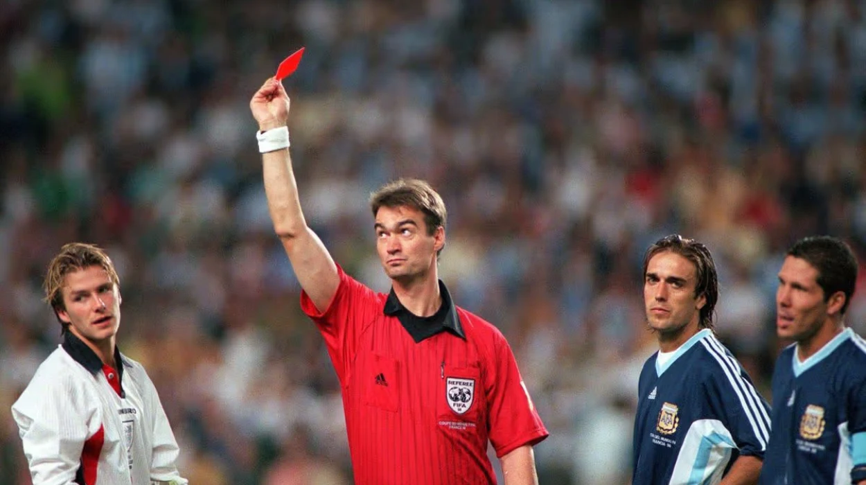 England Hit by Red Card in High-Stakes Clash