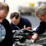 UK Manufacturing Growth Slows as Hiring Hits Two-Year High
